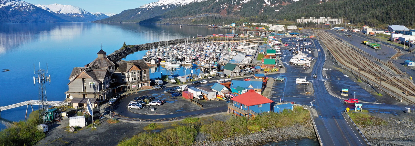 Aerial view of Whittier including harbor.